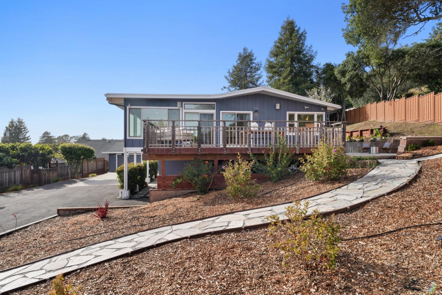 7440 Viewpoint Road Aptos, CA 95003 - Photo 2 of 39 a front view of a house with a yard