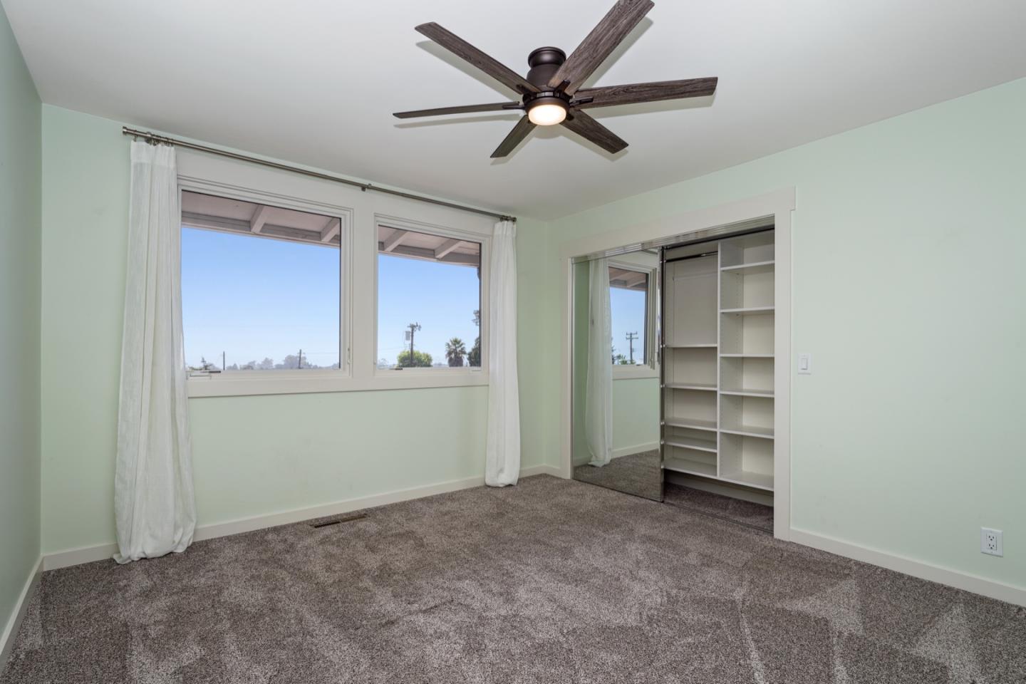 7440 Viewpoint Road Aptos, CA 95003 - Photo 26 of 39 a view of room with closet and ceiling fan