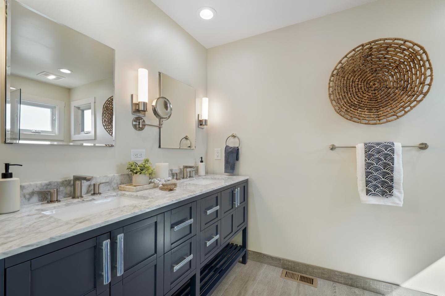 7440 Viewpoint Road Aptos, CA 95003 - Photo 29 of 39 a bathroom with a double vanity sink and a mirror