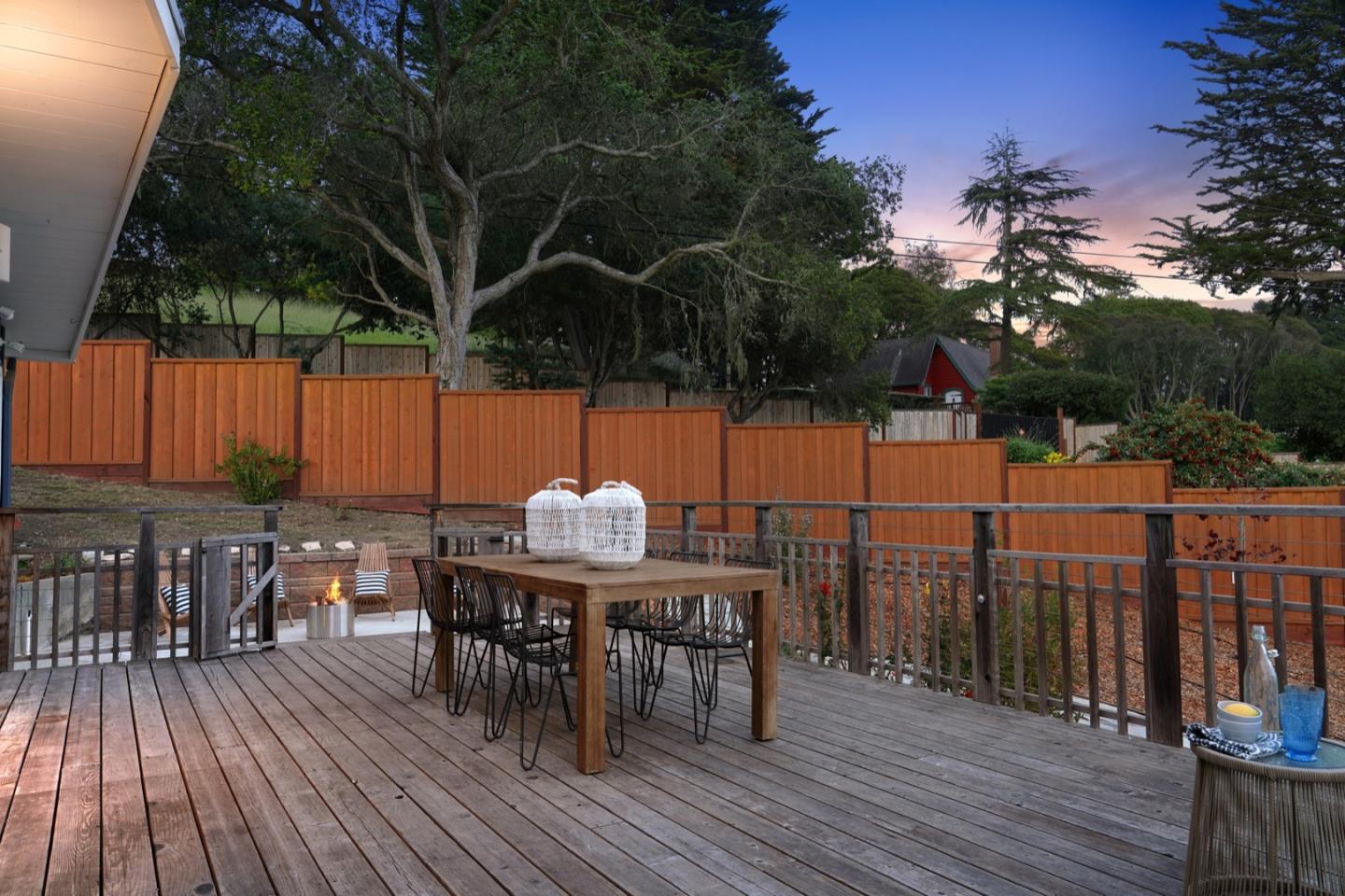 7440 Viewpoint Road Aptos, CA 95003 - Photo 36 of 39 a view of a roof deck with table and chairs a barbeque with wooden floor and fence
