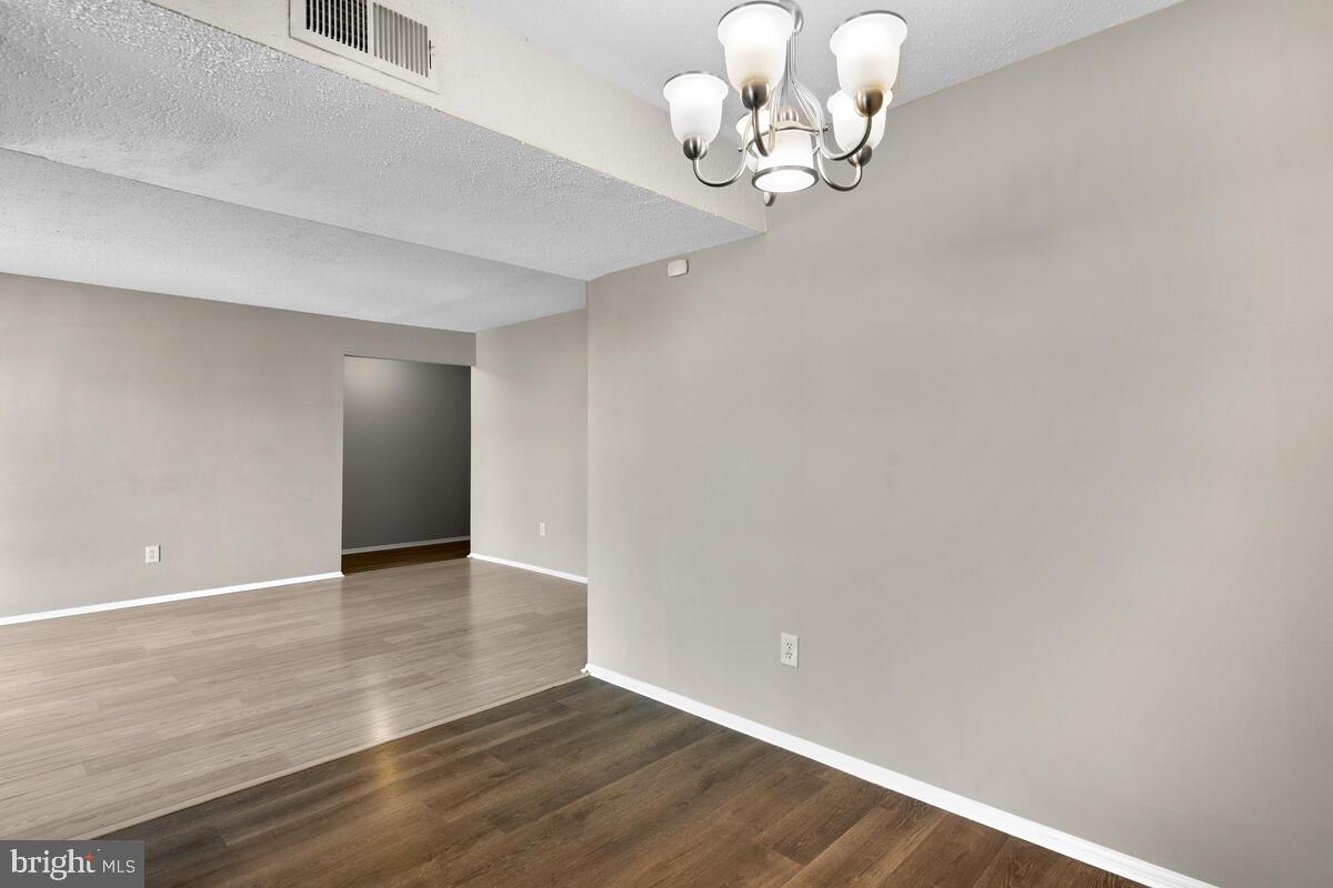 106 Fort Evans Road Southeast, Unit A Leesburg, VA 20175 - Photo 16 of 29 Dining Room/Living Room, Main Level