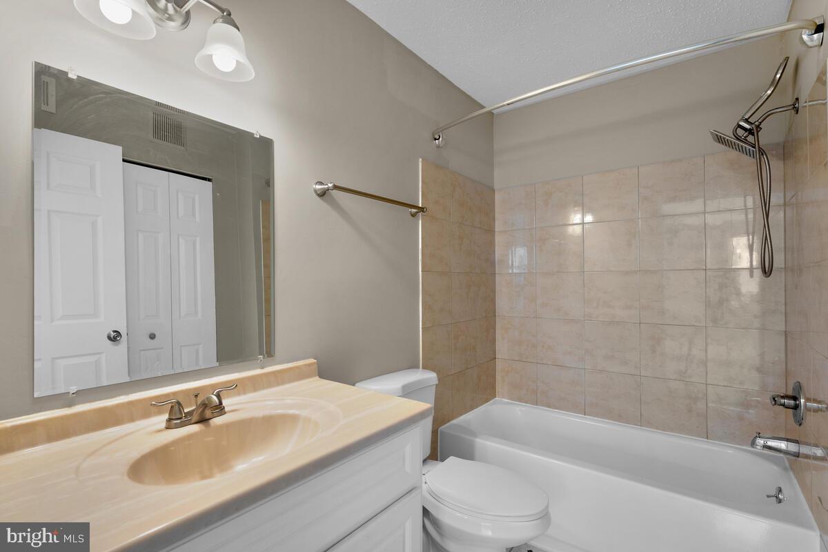 106 Fort Evans Road Southeast, Unit A Leesburg, VA 20175 - Photo 19 of 29 Primary Bath w/Washer Dryer, Main Level
