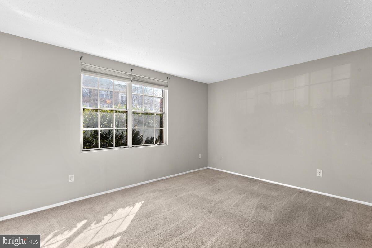 106 Fort Evans Road Southeast, Unit A Leesburg, VA 20175 - Photo 20 of 29 Primary Bedroom, Main Level