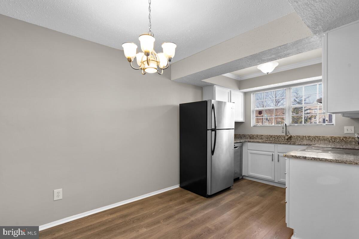 106 Fort Evans Road Southeast, Unit A Leesburg, VA 20175 - Photo 10 of 29 Dining Room/Kitchen, Main Level