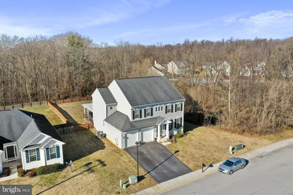 a view of a house with a mountain in the background
