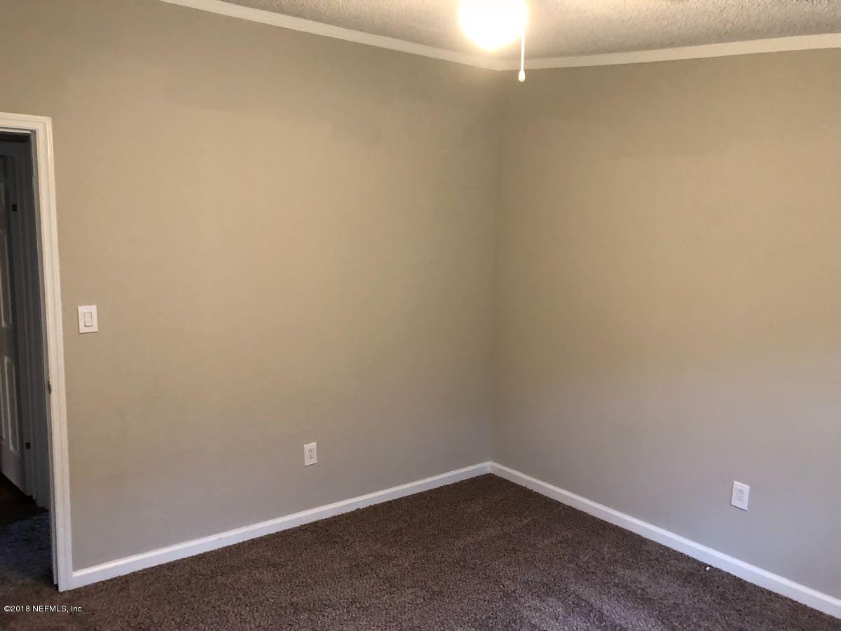 54254 Heller Road Callahan, FL 32011 - Photo 15 of 25 a room that has a window in it