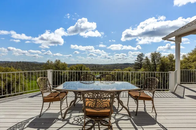 a view of a balcony with a swing