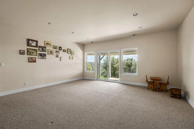 a view of room with window and toys