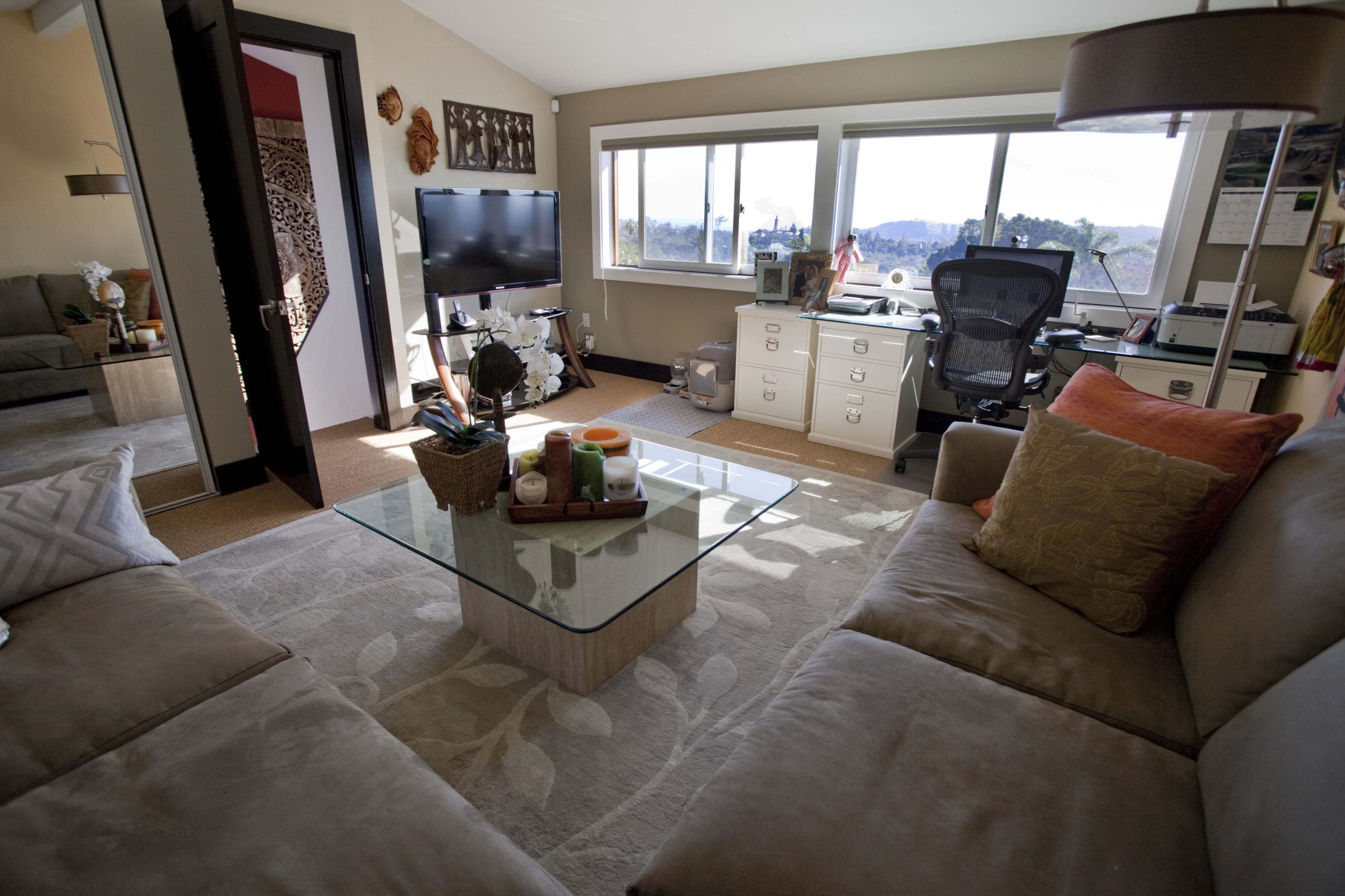 907 Cheltenham Road Santa Barbara, CA 93105 - Photo 29 of 31 a living room with furniture and a flat screen tv