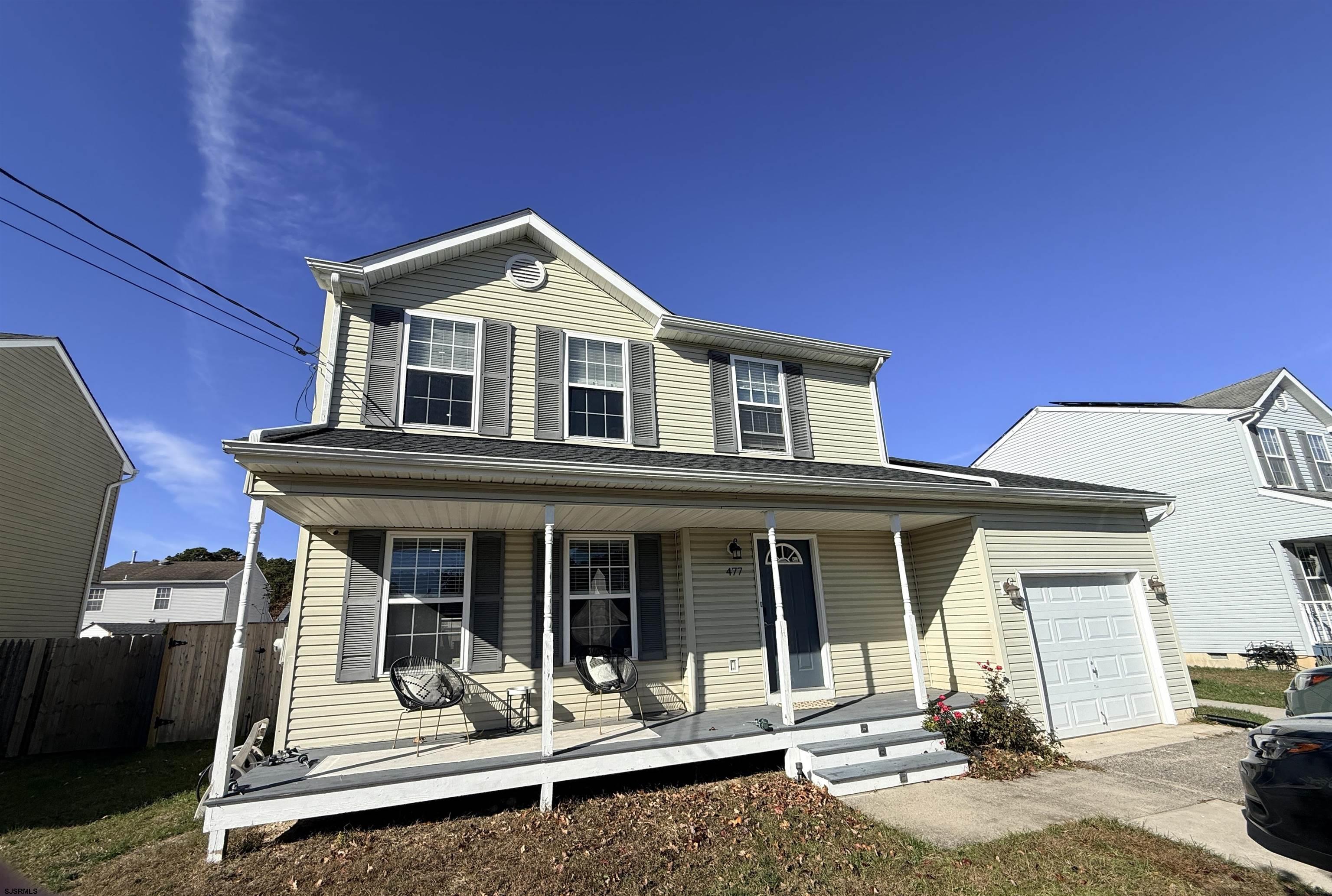 477 Damson Avenue Galloway Township, NJ 08205 - Photo 1 of 24 a front view of a house with garden