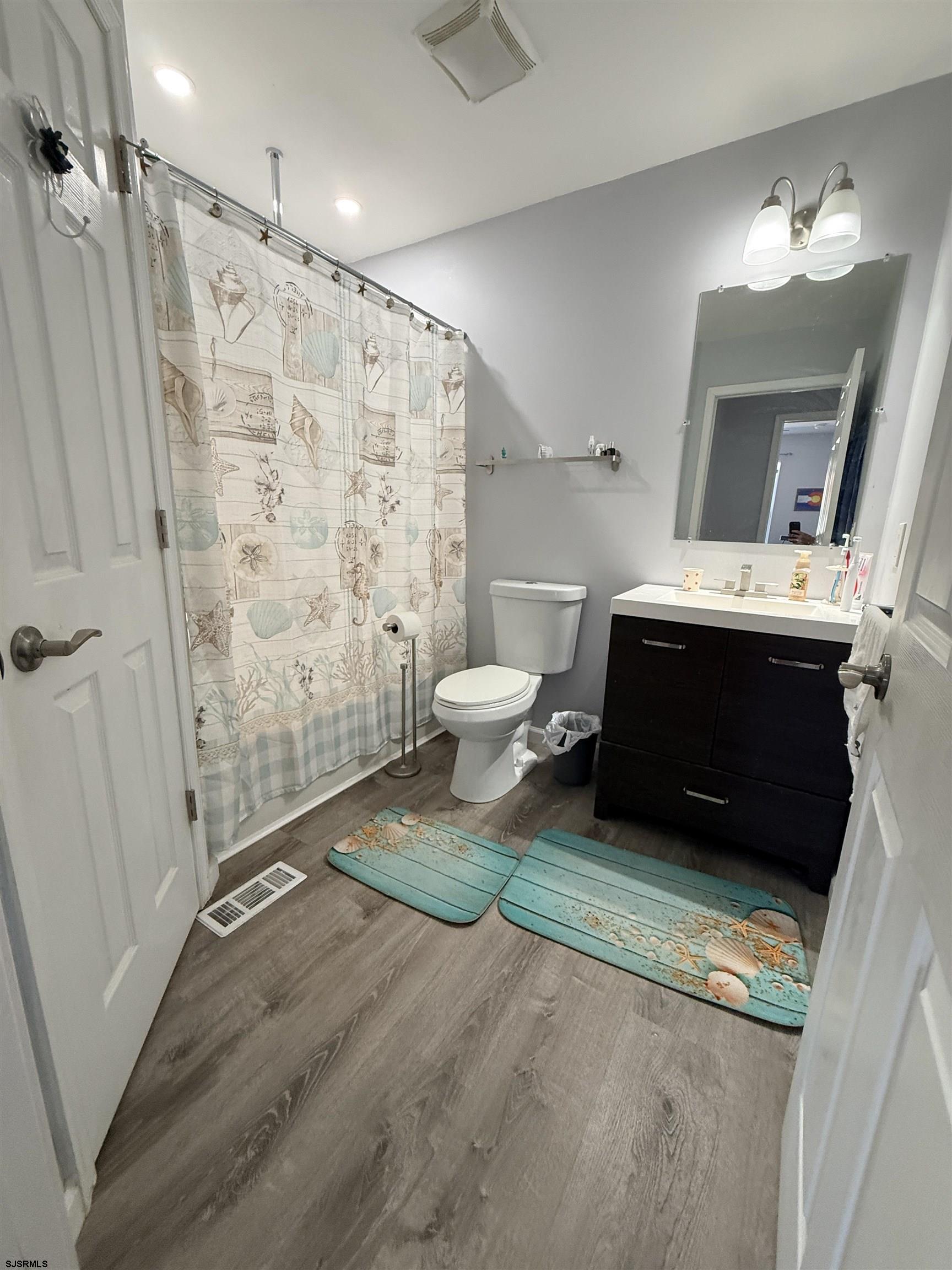 477 Damson Avenue Galloway Township, NJ 08205 - Photo 12 of 24 a bathroom with a sink a toilet and shower