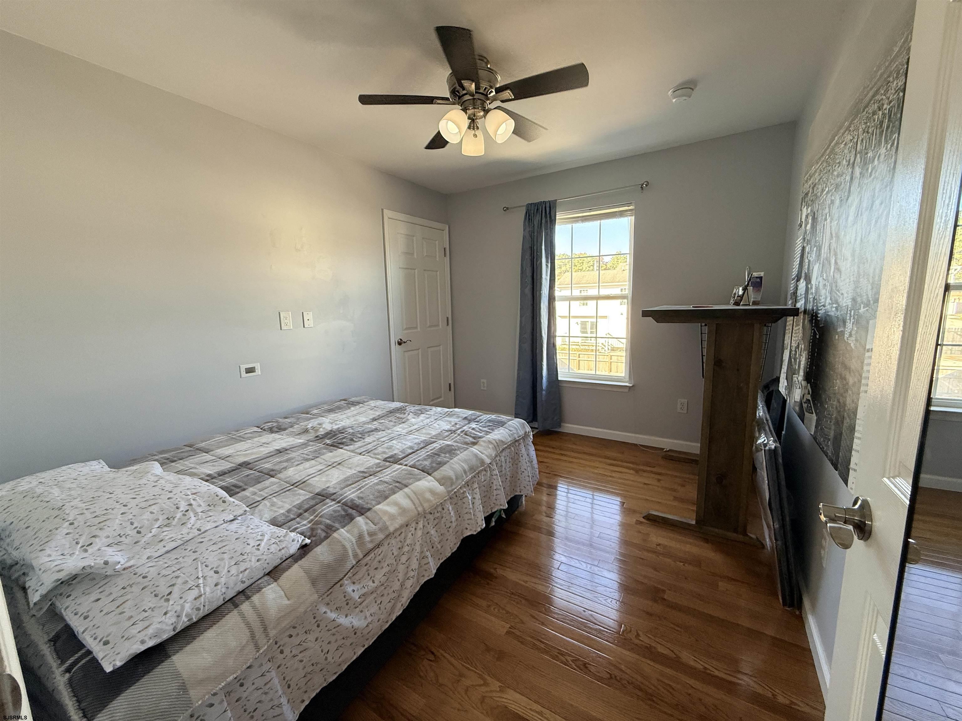 477 Damson Avenue Galloway Township, NJ 08205 - Photo 13 of 24 a bedroom with bed and window