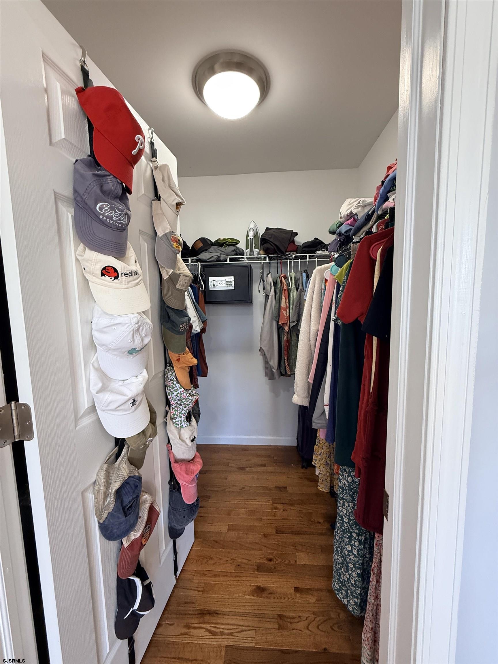 477 Damson Avenue Galloway Township, NJ 08205 - Photo 16 of 24 a view of walk in closet with clothes and shoes