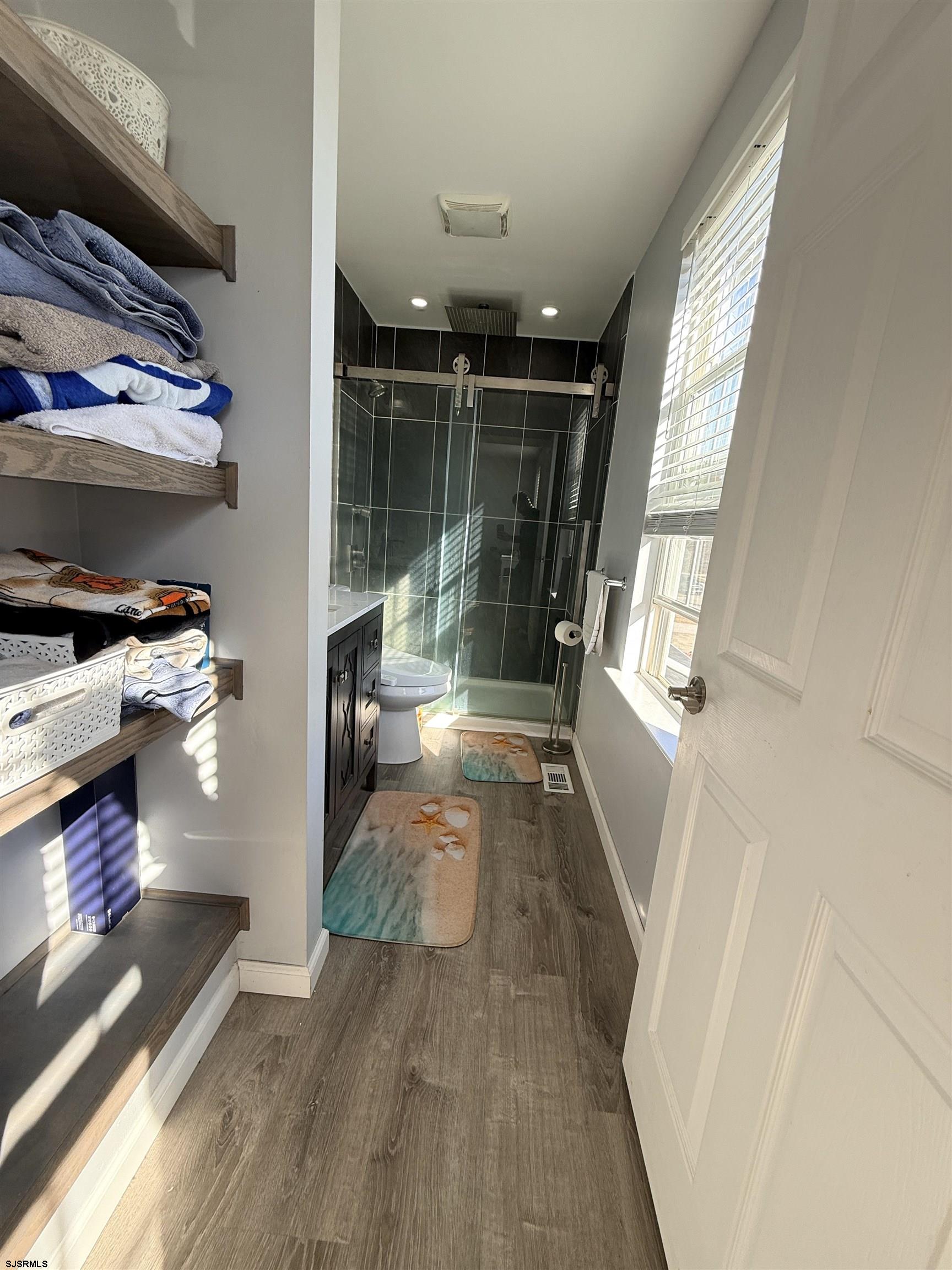 477 Damson Avenue Galloway Township, NJ 08205 - Photo 17 of 24 a view of entryway with wooden floor and a rug