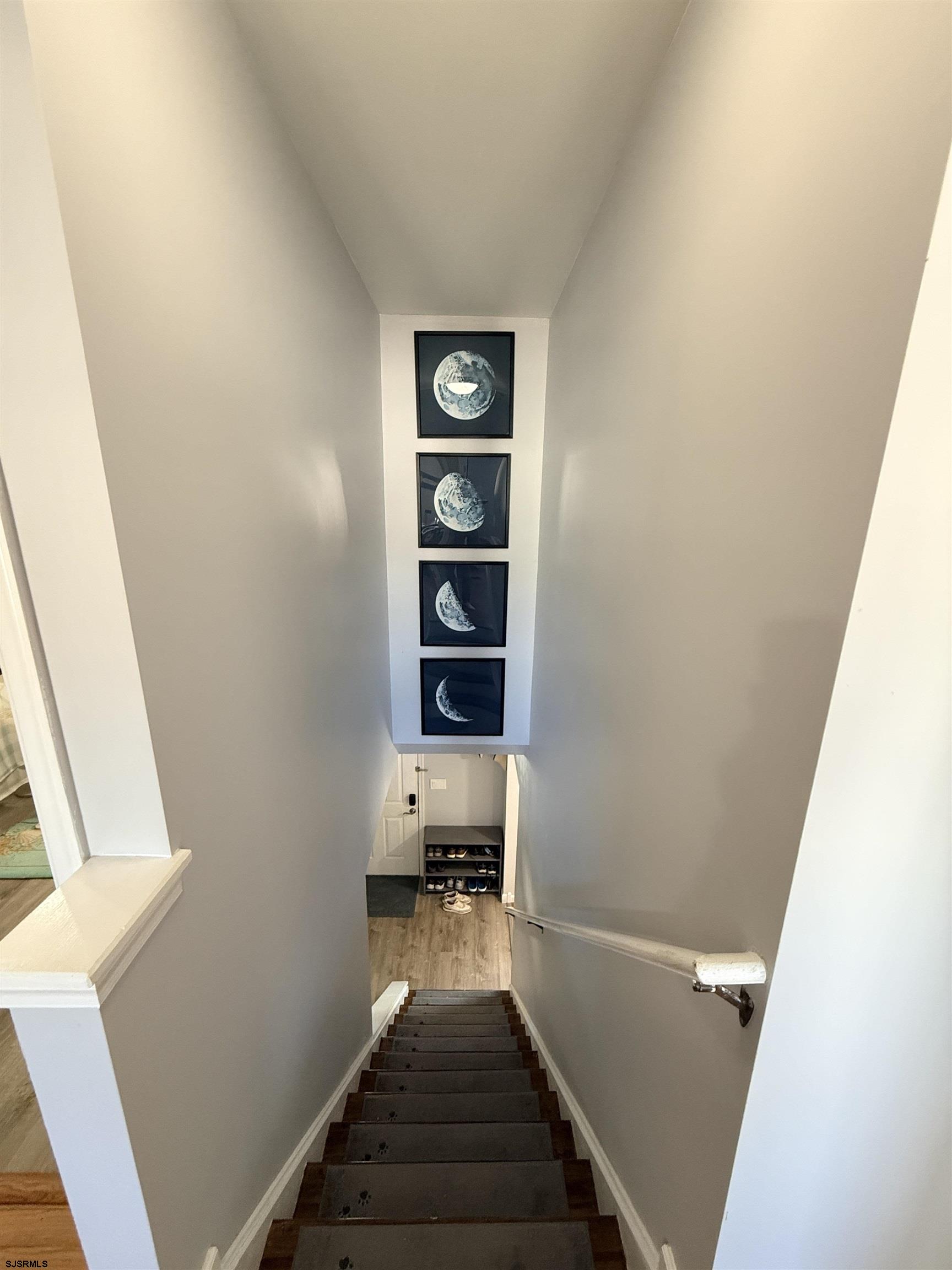 477 Damson Avenue Galloway Township, NJ 08205 - Photo 19 of 24 a view of a hallway with wooden floor and staircase