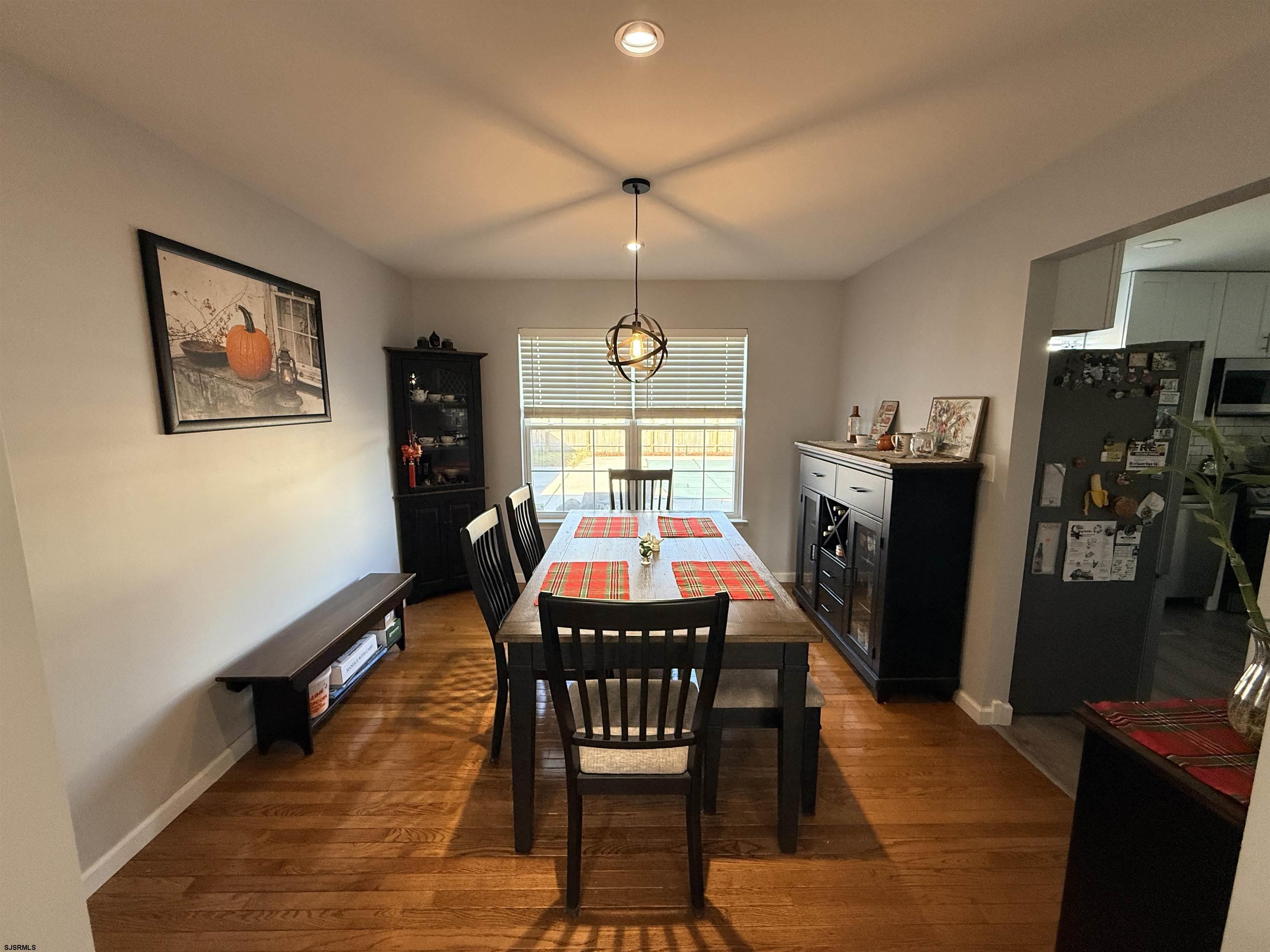 477 Damson Avenue Galloway Township, NJ 08205 - Photo 4 of 24 a dining room with furniture window and wooden floor