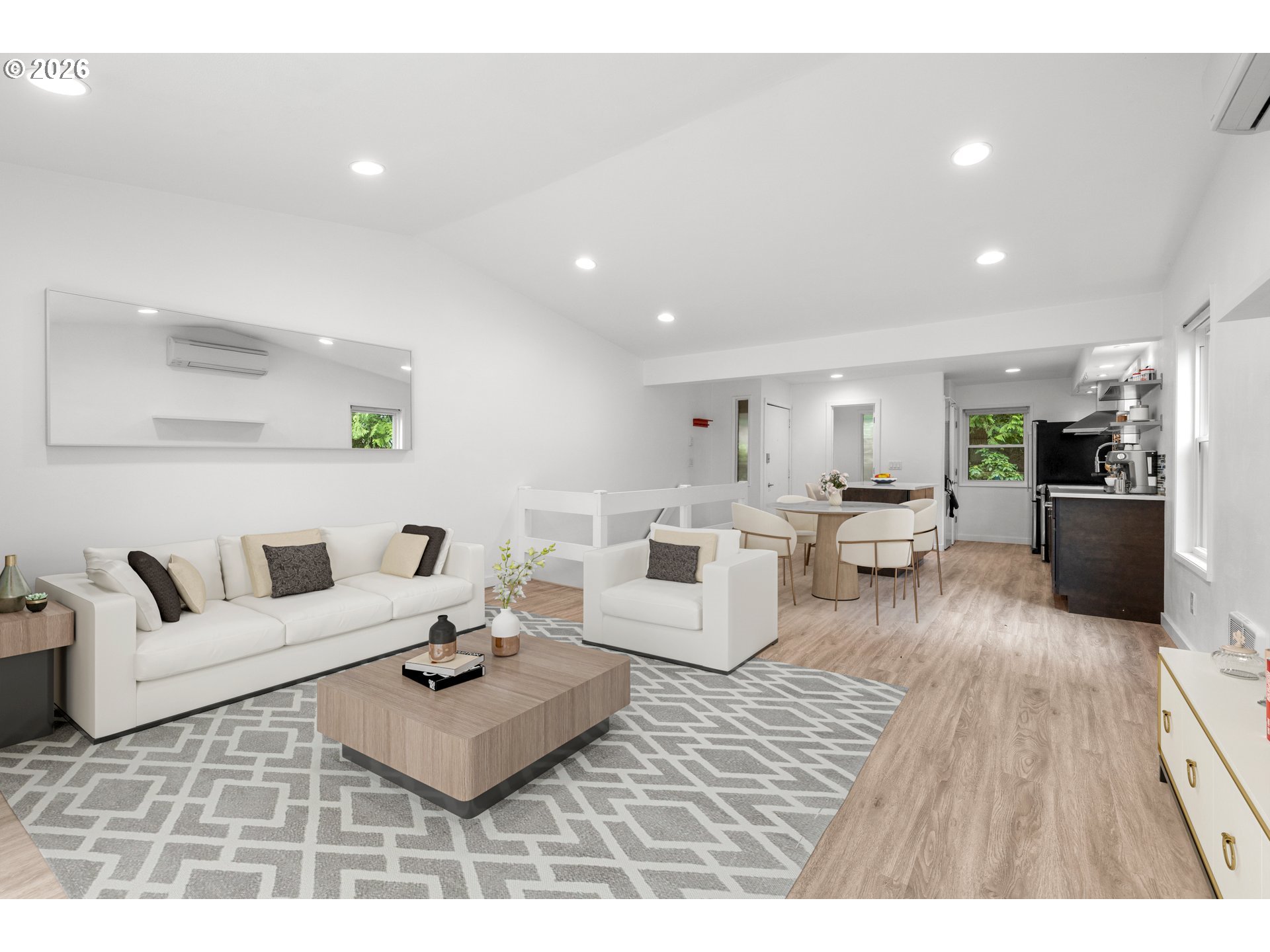 4594 Southwest Caldew Street, Unit A Portland, OR 97219 - Photo 11 of 29 a living room with furniture and a wooden floor