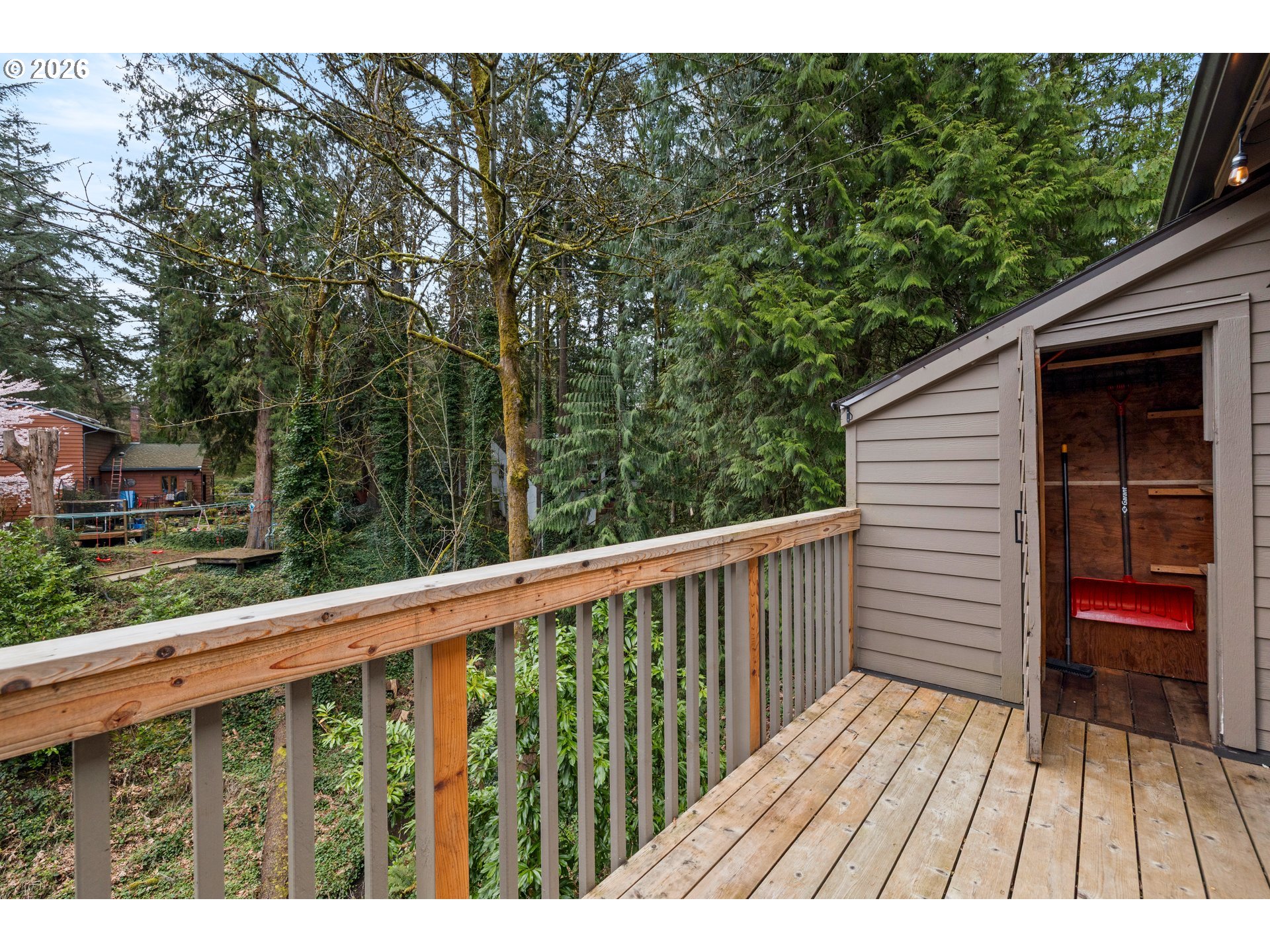 4594 Southwest Caldew Street, Unit A Portland, OR 97219 - Photo 23 of 29 a view of balcony with wooden floor