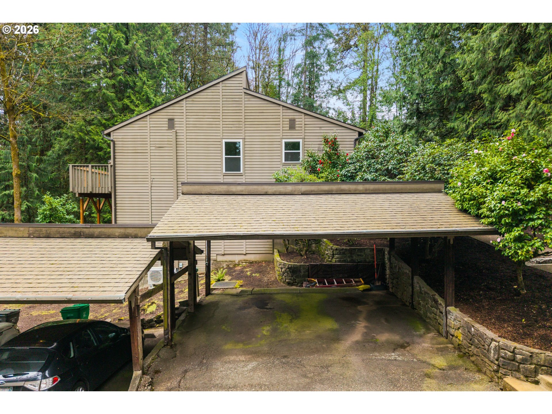 4594 Southwest Caldew Street, Unit A Portland, OR 97219 - Photo 29 of 29 a view of house with outdoor space