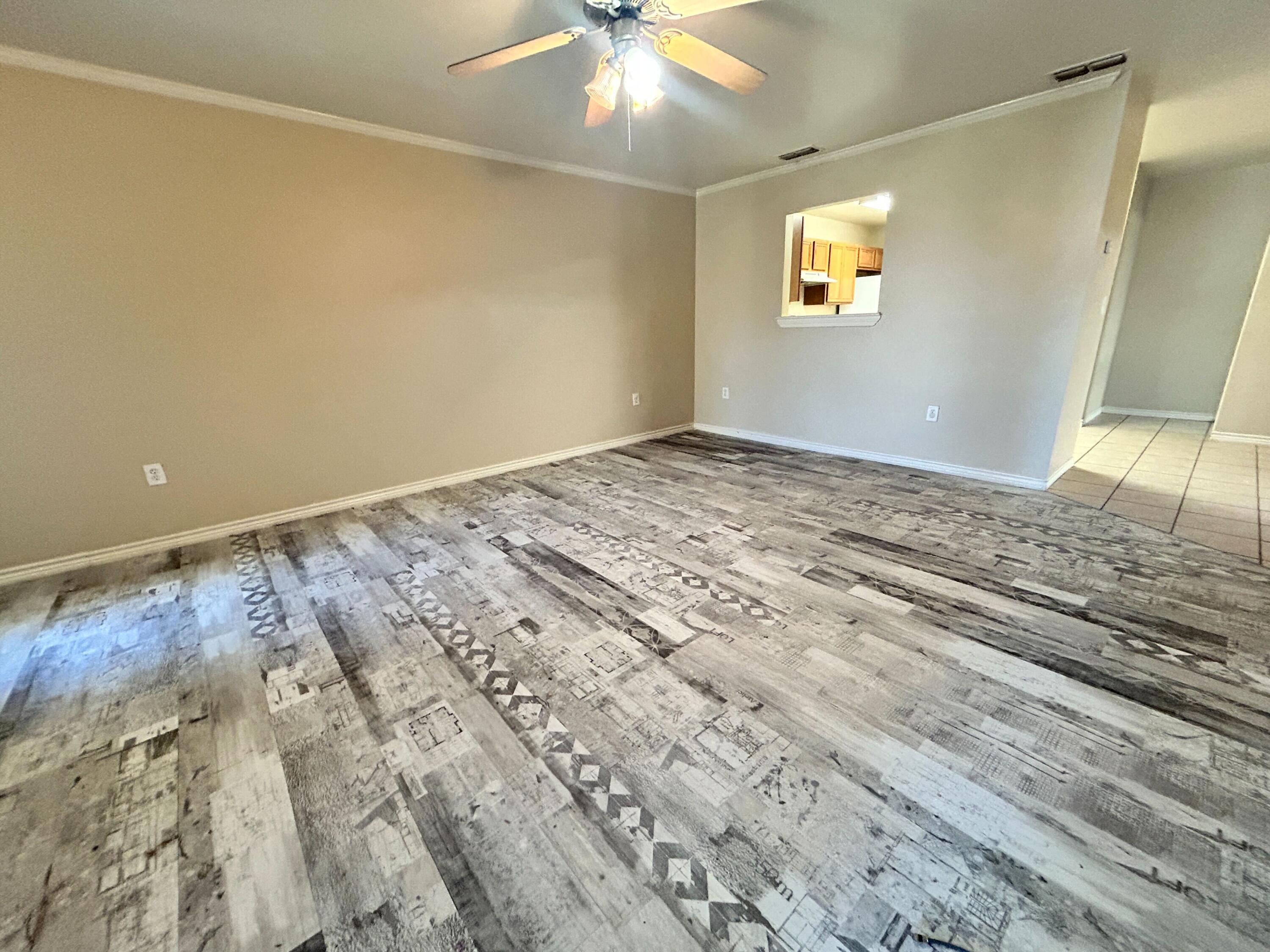 5413 Harvard Street, Unit B Lubbock, TX 79416 - Photo 3 of 10 a view of a room