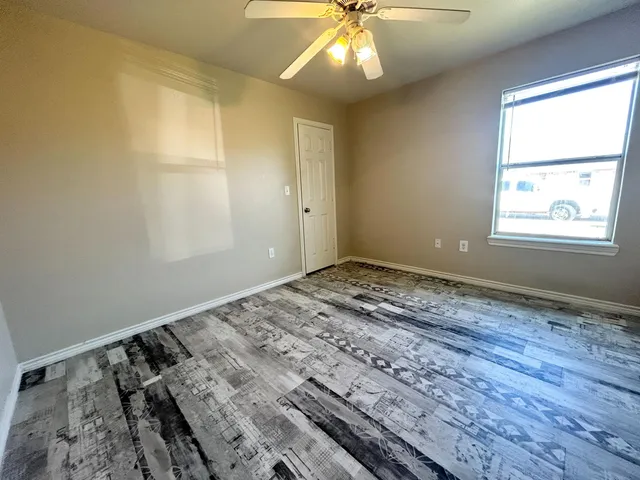 a view of an empty room and window