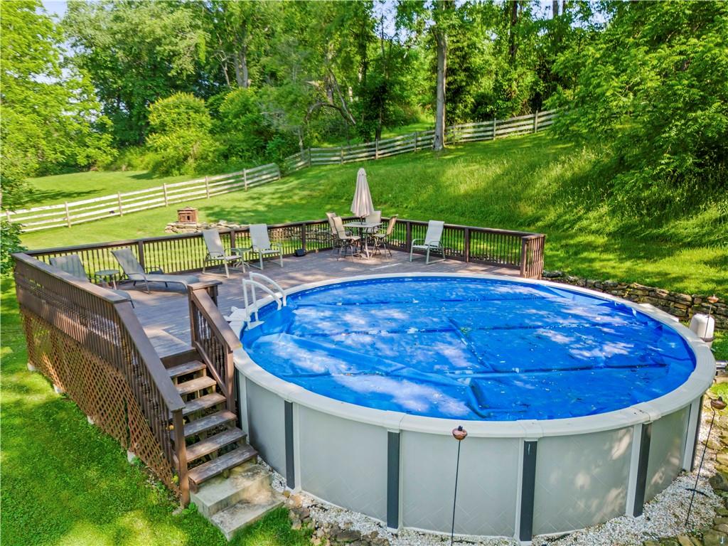 117 Havers Hill Road Jefferson, PA 15344 - Photo 12 of 44 a view of a swimming pool with a patio