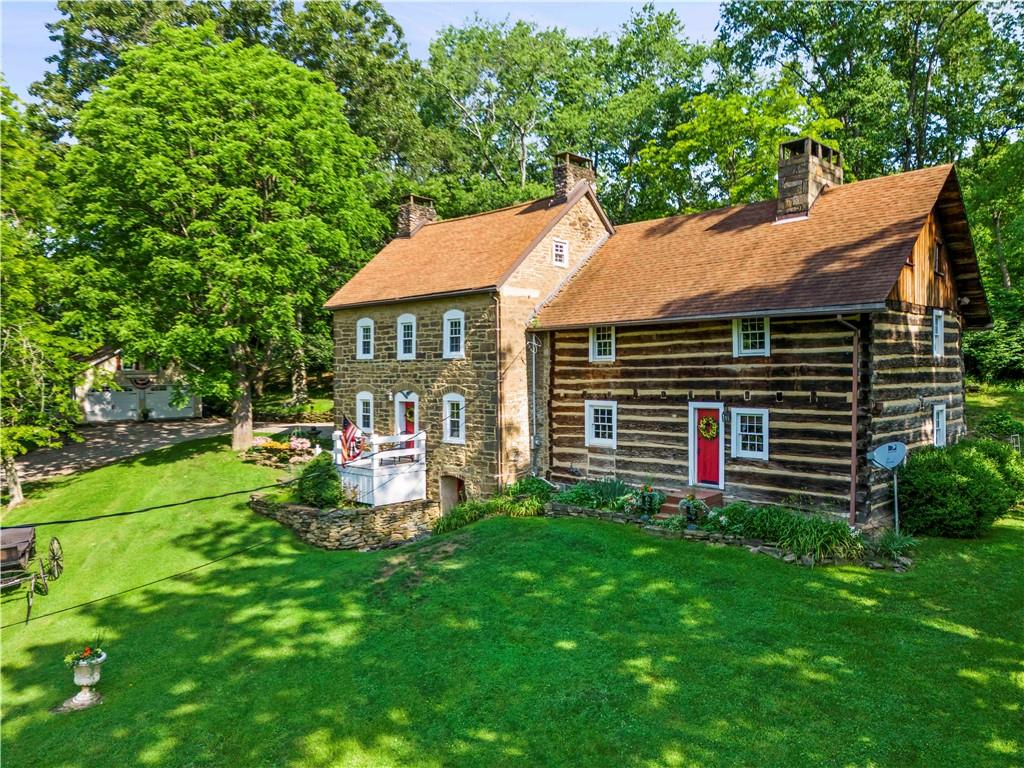 117 Havers Hill Road Jefferson, PA 15344 - Photo 2 of 44 a front view of a house with yard and tree s