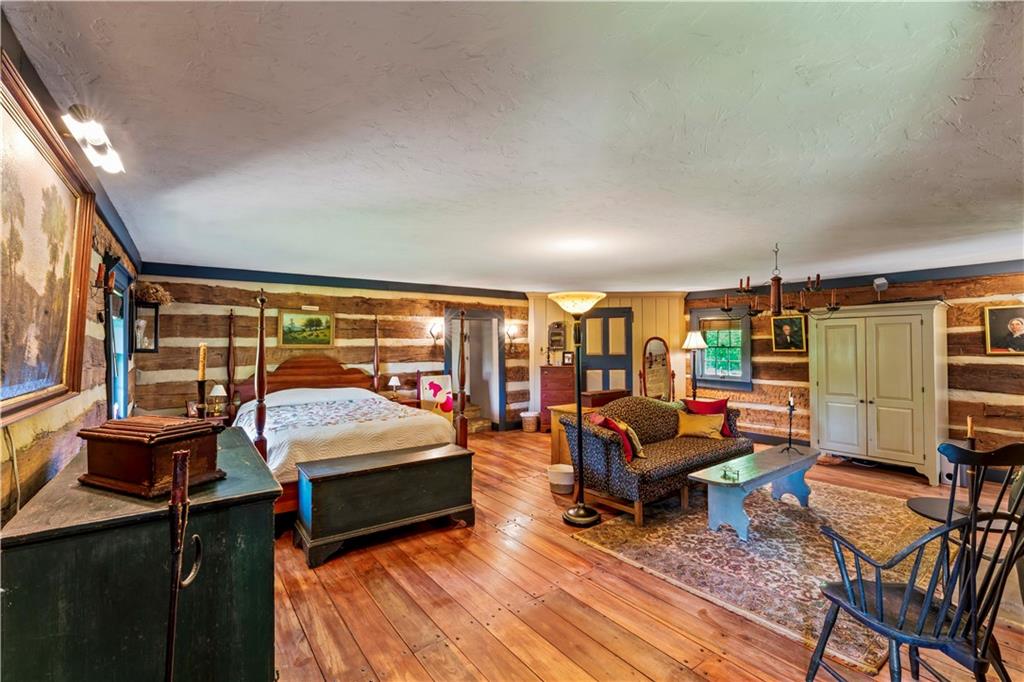 117 Havers Hill Road Jefferson, PA 15344 - Photo 28 of 44 a bedroom with furniture and large window