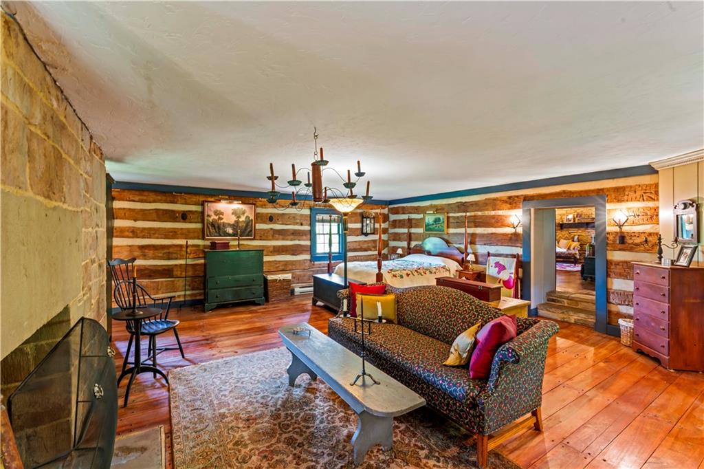 117 Havers Hill Road Jefferson, PA 15344 - Photo 30 of 44 a living room with furniture and a chandelier