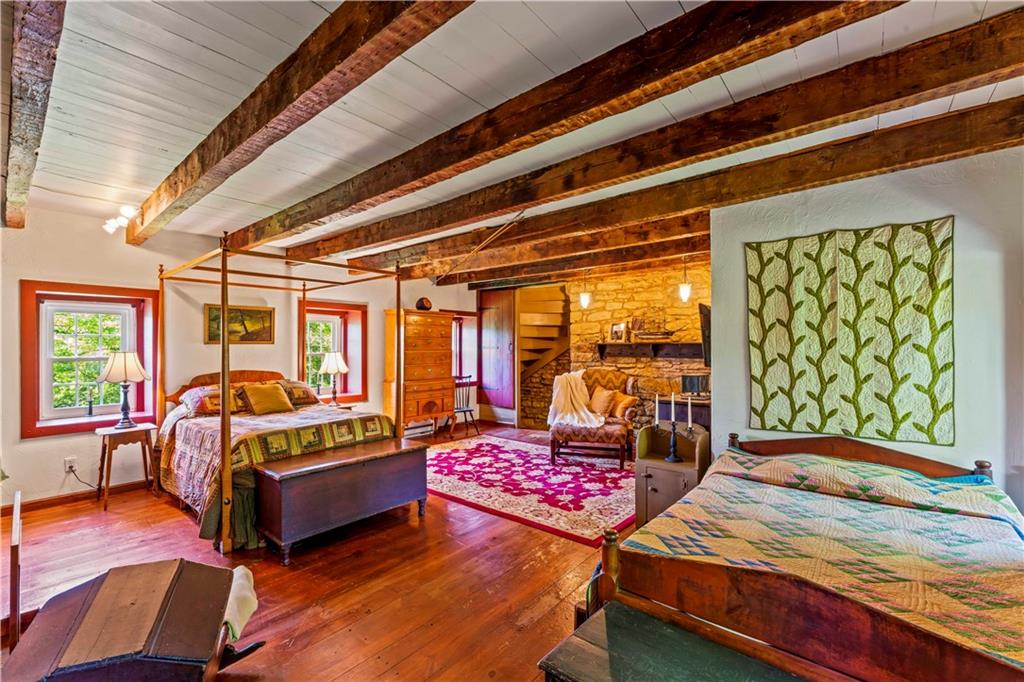 117 Havers Hill Road Jefferson, PA 15344 - Photo 34 of 44 a bedroom with furniture and a large window