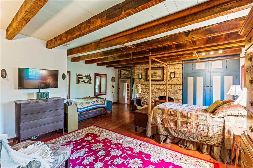 117 Havers Hill Road Jefferson, PA 15344 - Photo 36 of 44 a living room with furniture and a flat screen tv