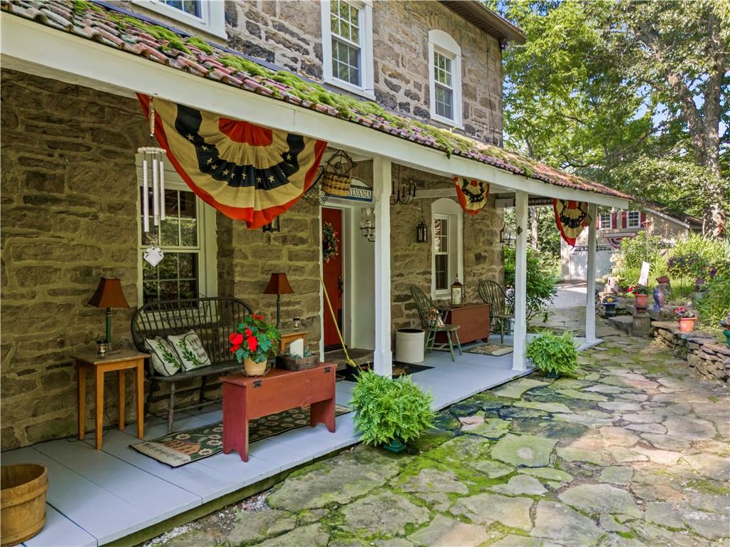 117 Havers Hill Road Jefferson, PA 15344 - Photo 5 of 44 a front view of a building with sitting area