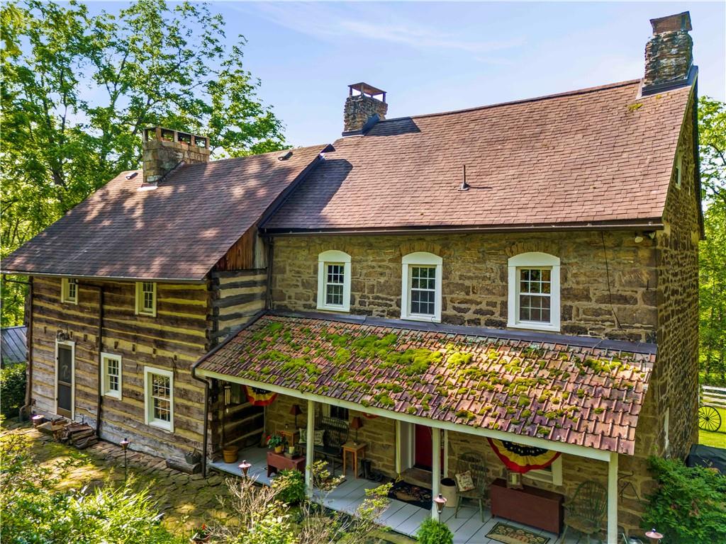 117 Havers Hill Road Jefferson, PA 15344 - Photo 6 of 44 a front view of a house with garden
