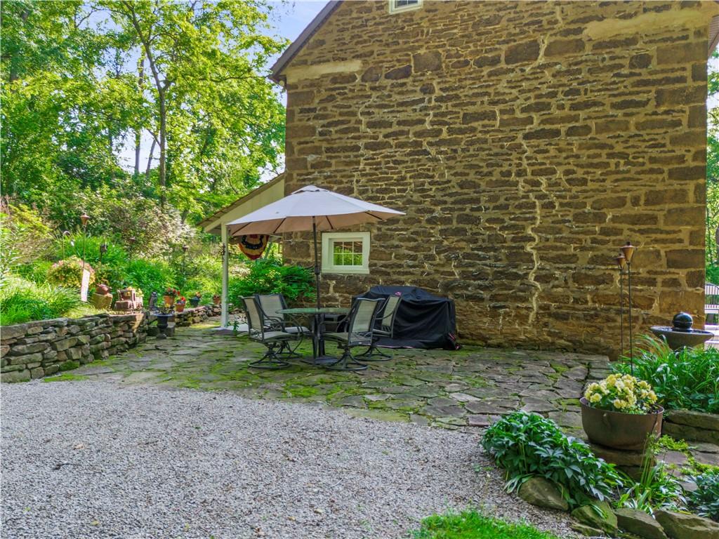 117 Havers Hill Road Jefferson, PA 15344 - Photo 9 of 44 a view of a backyard with sitting area and furniture