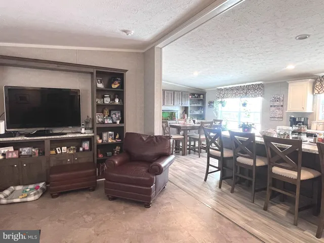 a kitchen with a sink and a window