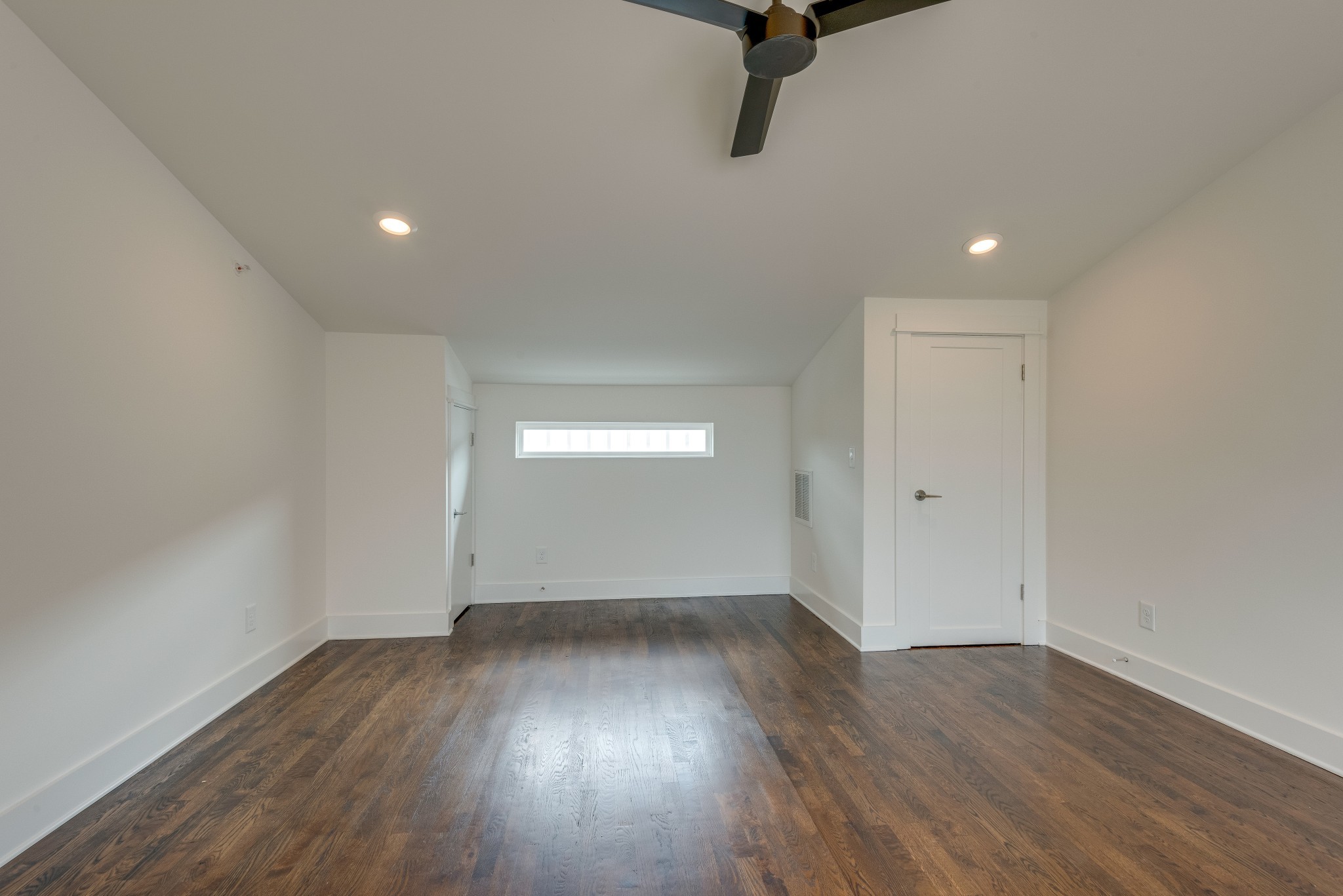 2001 Convent Place, Unit 16 Nashville, TN 37212 - Photo 16 of 24 a view of a room with wooden floor and window