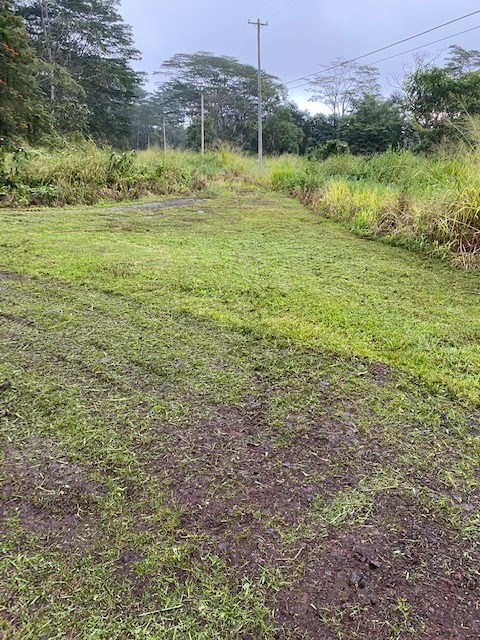22 A Lot 22-a Kuaina Keaau, HI 96749 - Photo 2 of 4 a view of a houses with outdoor space and trees all around