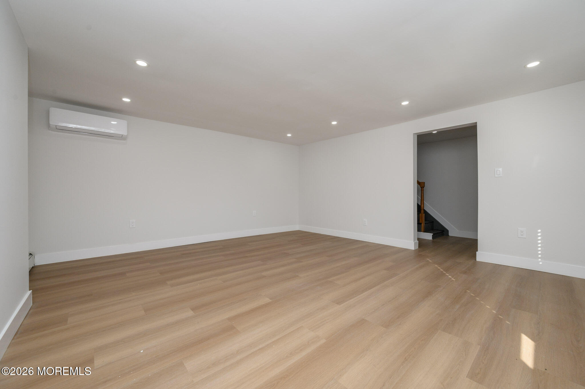 8 Orchard Street Matawan, NJ 07747 - Photo 15 of 34 a view of an empty room with wooden floor