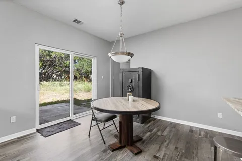 a kitchen with a sink stove and refrigerator