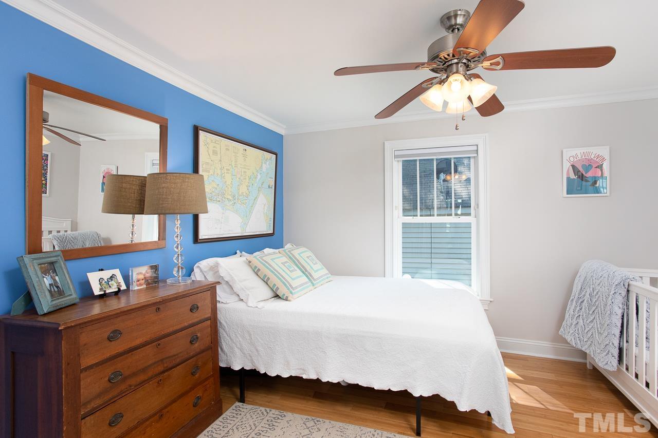 1509 South Roxboro Street Durham, NC 27707 - Photo 15 of 30 a bedroom with a bed and a window