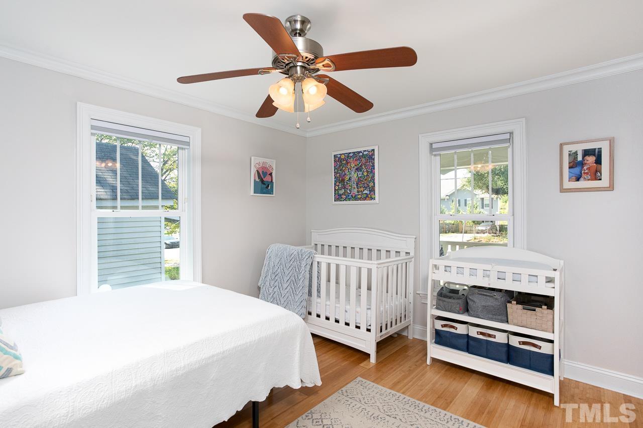 1509 South Roxboro Street Durham, NC 27707 - Photo 16 of 30 a bedroom with a bed and a window