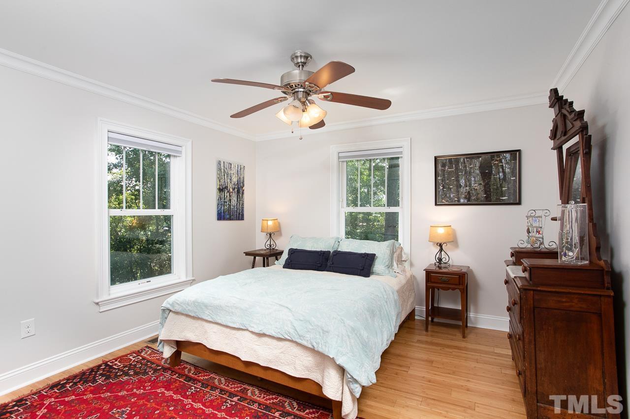 1509 South Roxboro Street Durham, NC 27707 - Photo 19 of 30 a bedroom with a bed and a window