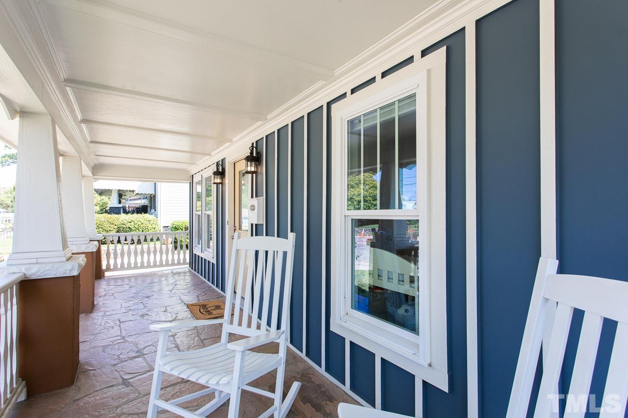 1509 South Roxboro Street Durham, NC 27707 - Photo 25 of 30 a view of a hallway with wooden floor and windows