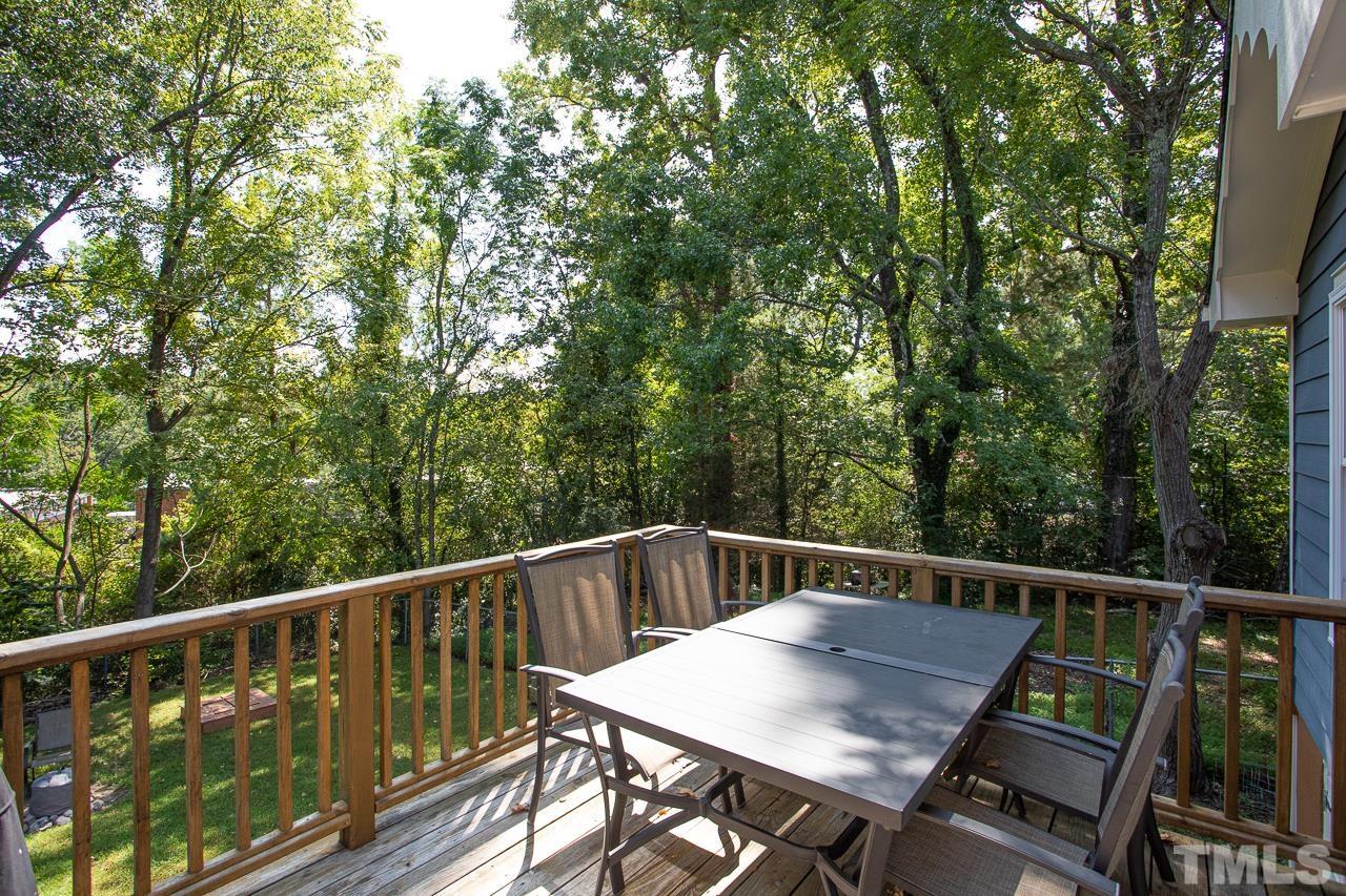 1509 South Roxboro Street Durham, NC 27707 - Photo 27 of 30 a view of a deck with two chairs and wooden fence