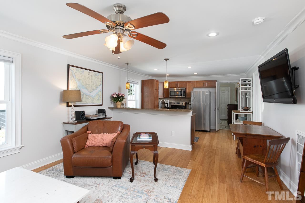 1509 South Roxboro Street Durham, NC 27707 - Photo 6 of 30 a living room with furniture and a flat screen tv