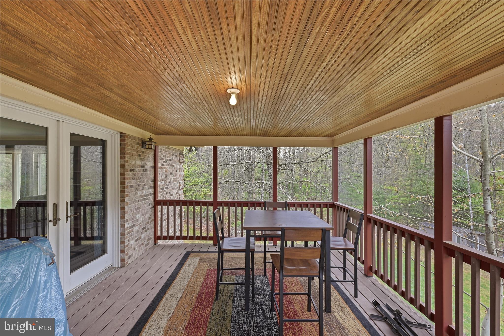 783 Ritters Valley Drive Capon Bridge, WV 26711 - Photo 21 of 73 Screened in Deck