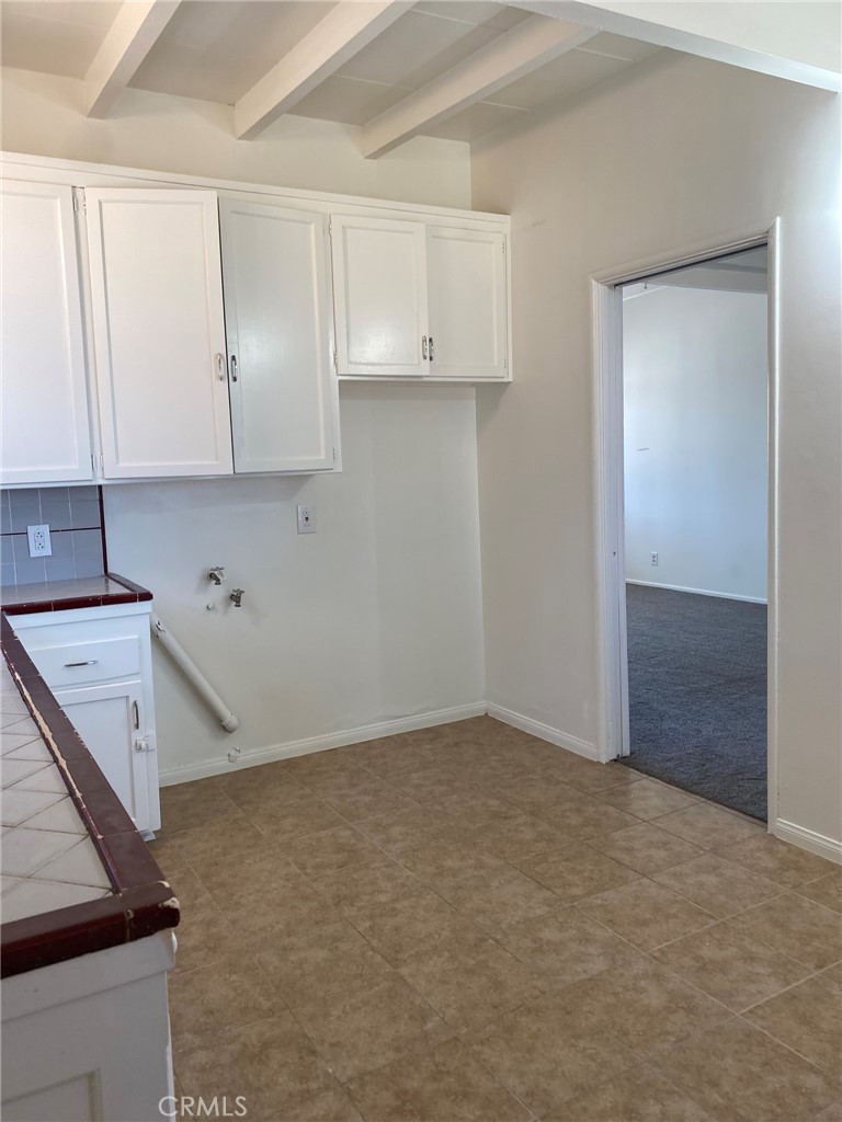 1713 West 165th Street Compton, CA 90220 - Photo 3 of 13 Kitchen, showing space for washer and dryer, or fridge.