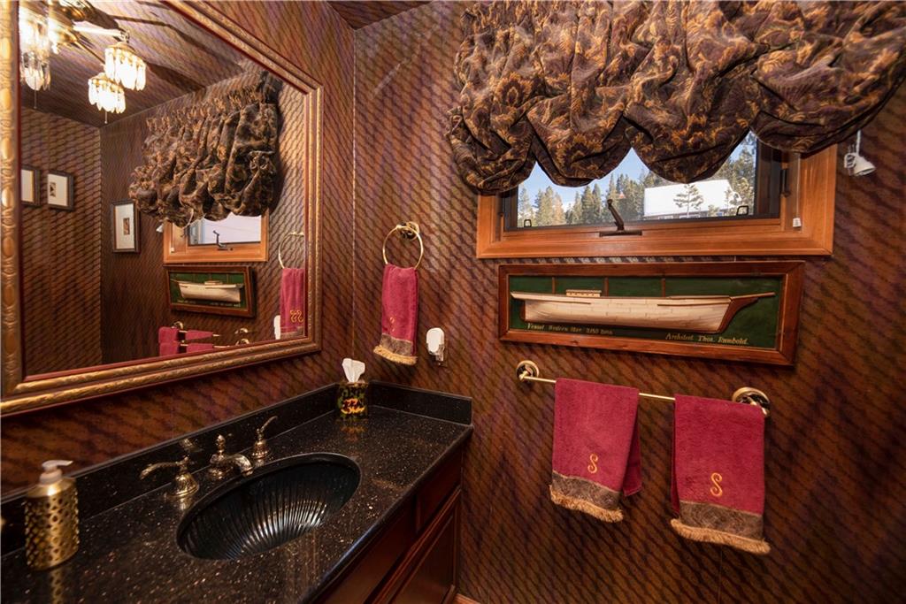 183 County Road 534 Breckenridge, CO 80424 - Photo 13 of 34 a bathroom with a sink and a mirror