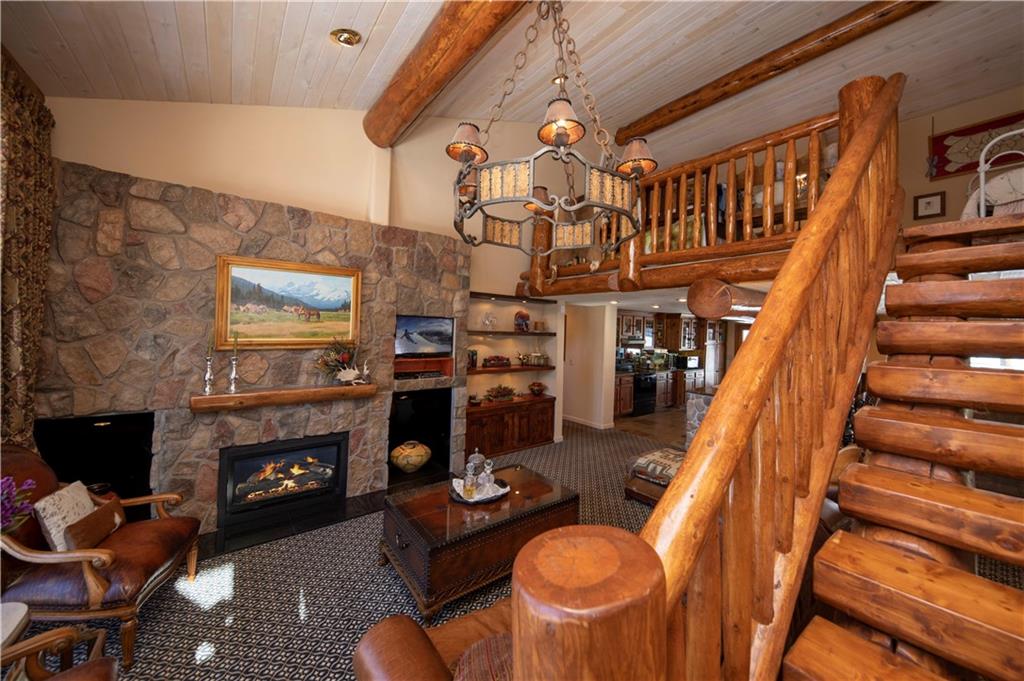 183 County Road 534 Breckenridge, CO 80424 - Photo 18 of 34 a living room with patio furniture and a fireplace