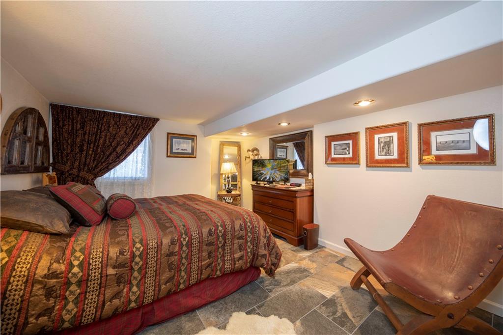 183 County Road 534 Breckenridge, CO 80424 - Photo 28 of 34 a bedroom with bed and balcony